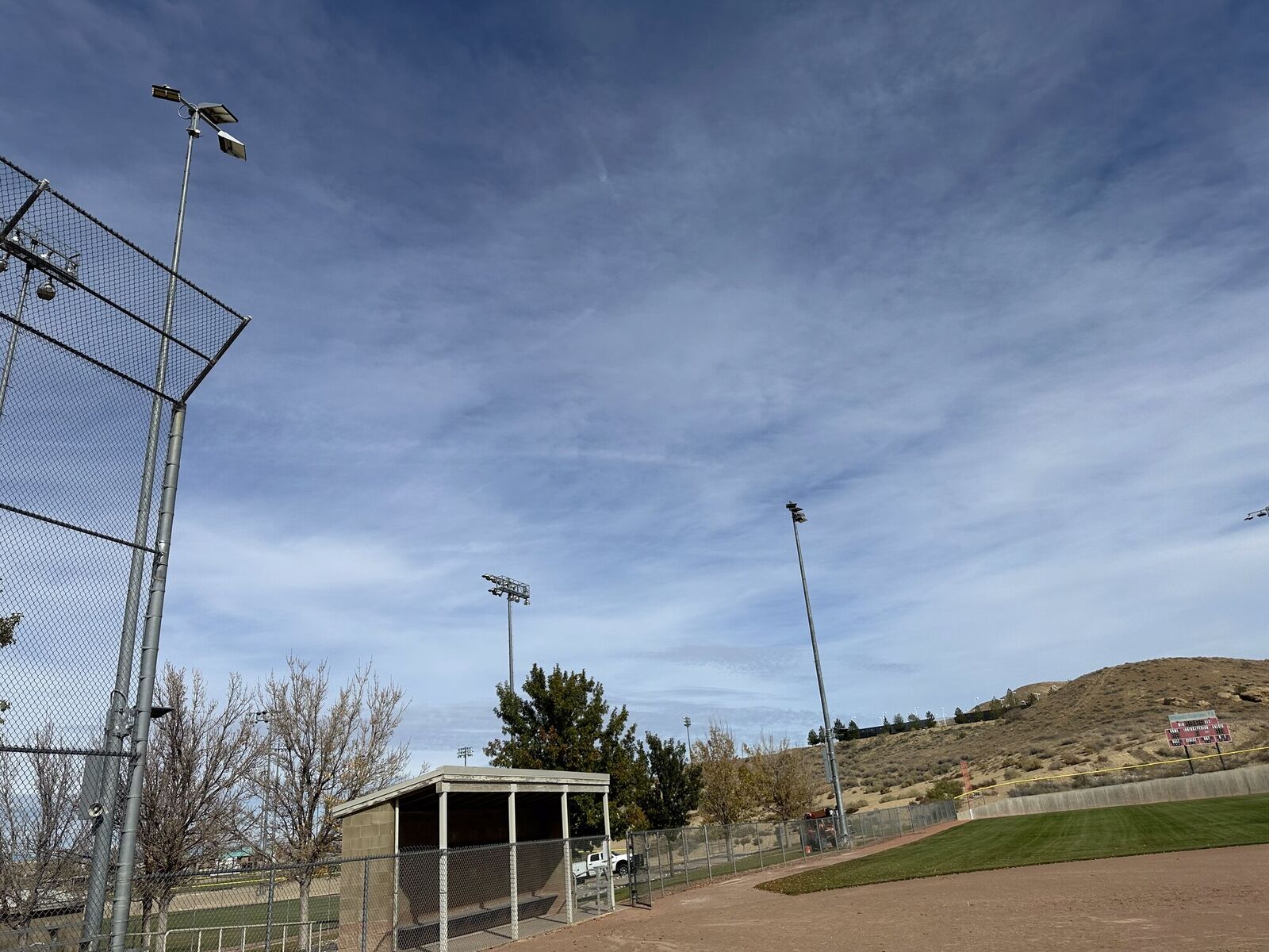 Sports lighting poles above a ballfield at Farmington Sports Complex